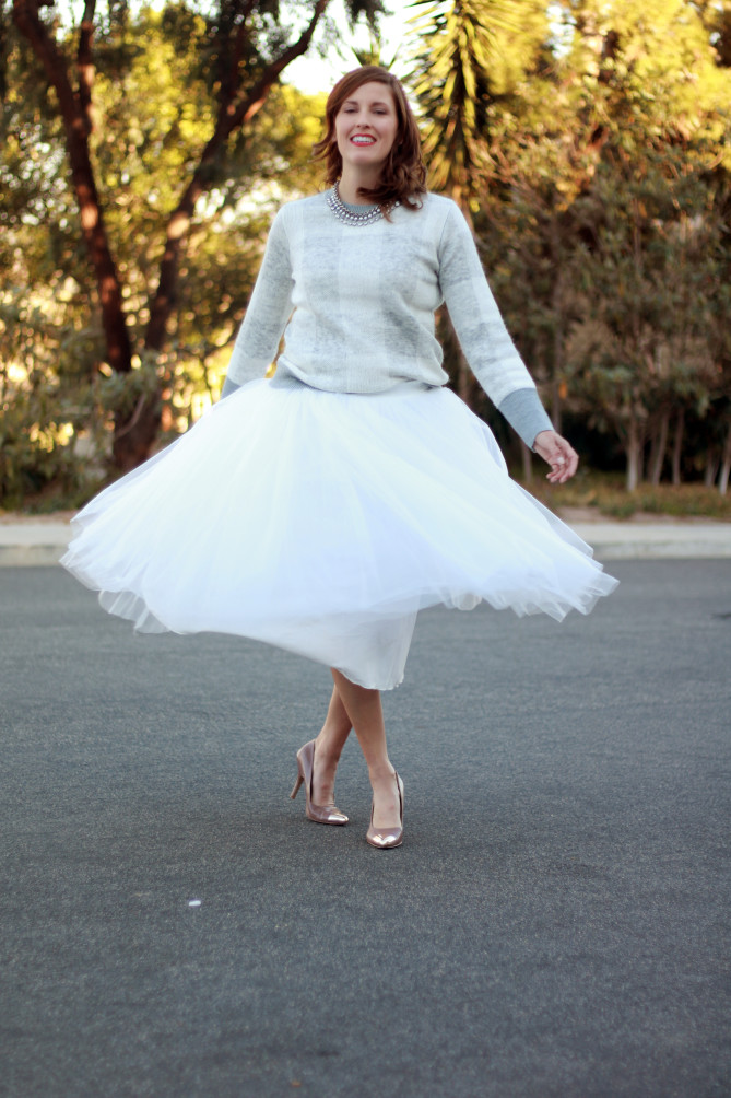holiday style with a tulle skirt and sweater.