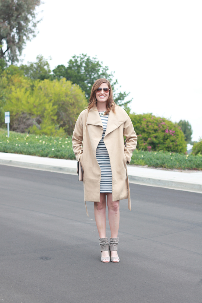 The perfect camel jacket paired with a striped dress. A great look for Spring brunch.