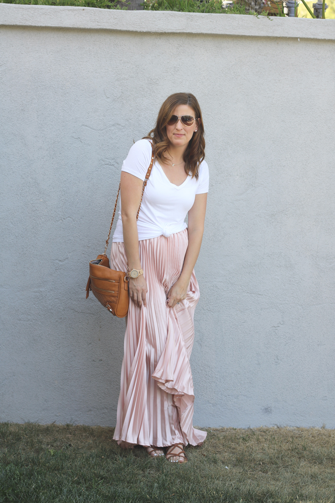 The perfect spring look with a pleated skirt and gladiator sandals. A great Sunday brunch look.