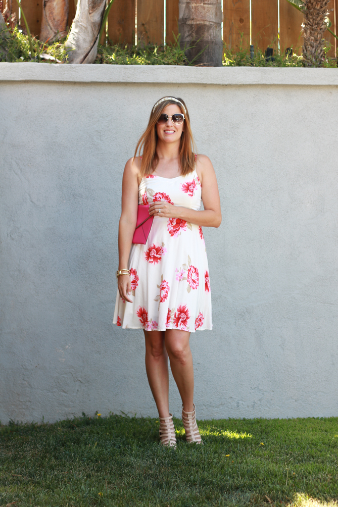Floral printed dress with a hot pink clutch and beaded headband. - The Fashionista Momma