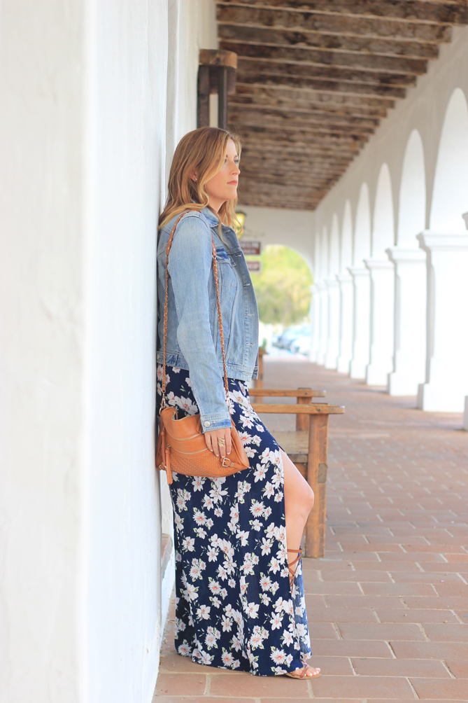 Summer style with a floral maxi skirt with a tank top and denim jacket.