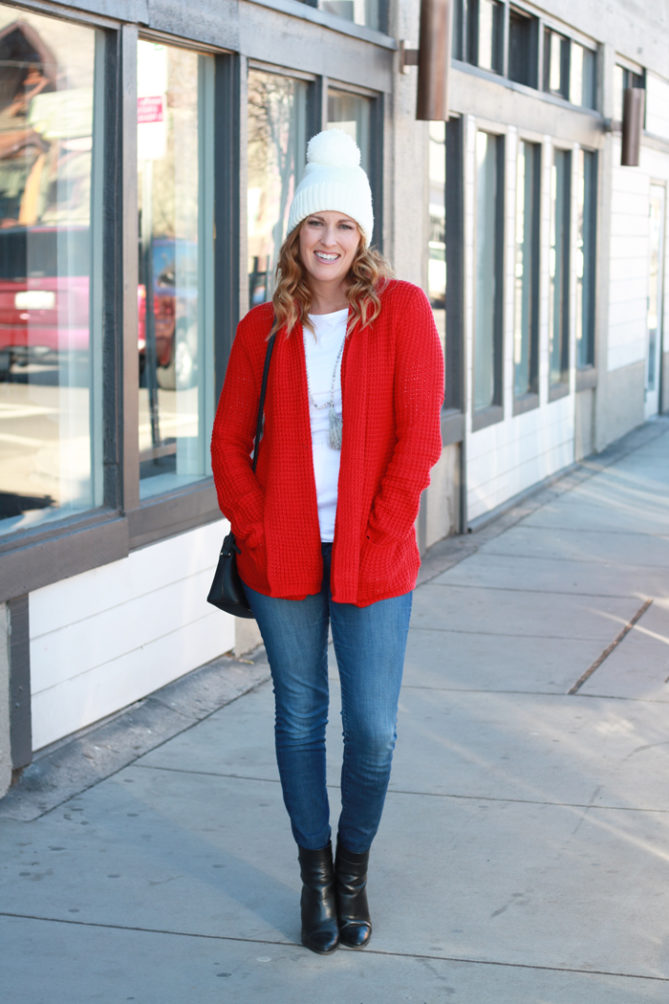 The red cardigan and beanie perfect for the holidays.