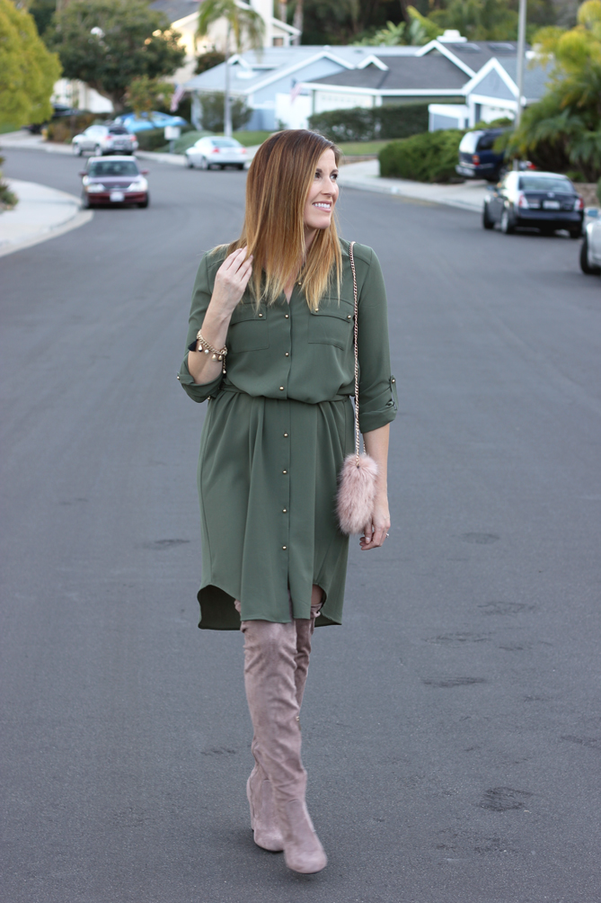 A shirt dress with over the knee boots and fur purse.