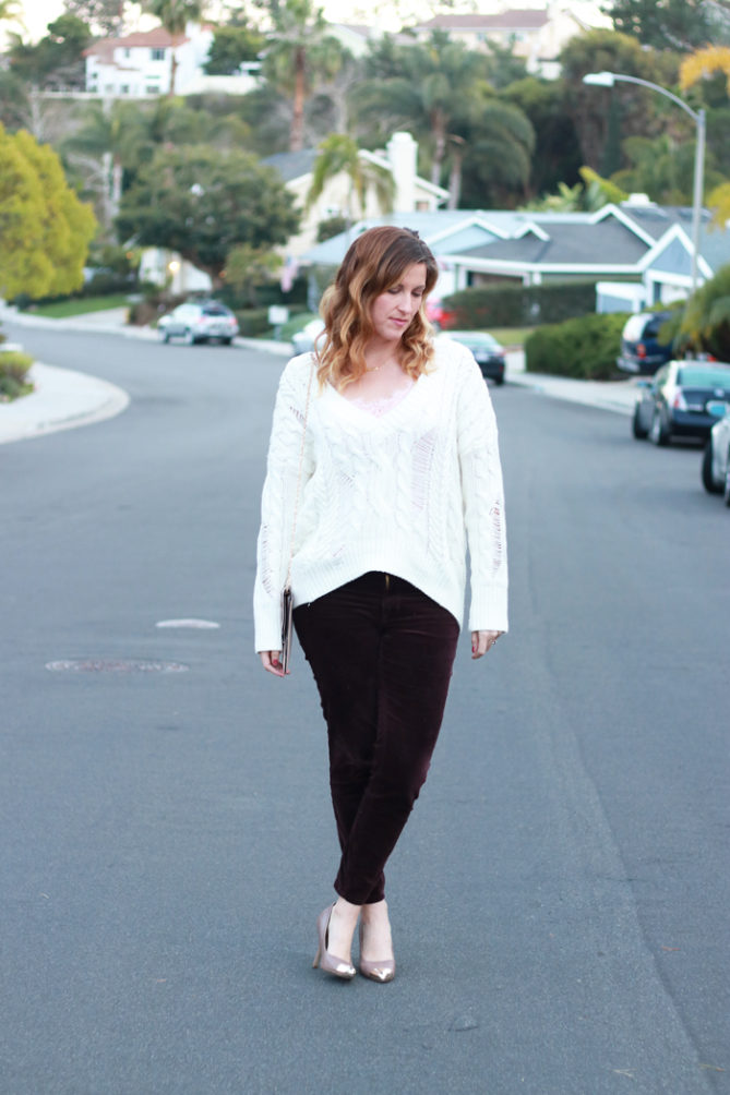 Burgundy velvet pants with an oversized sweater. The perfect Valentine's Day look.