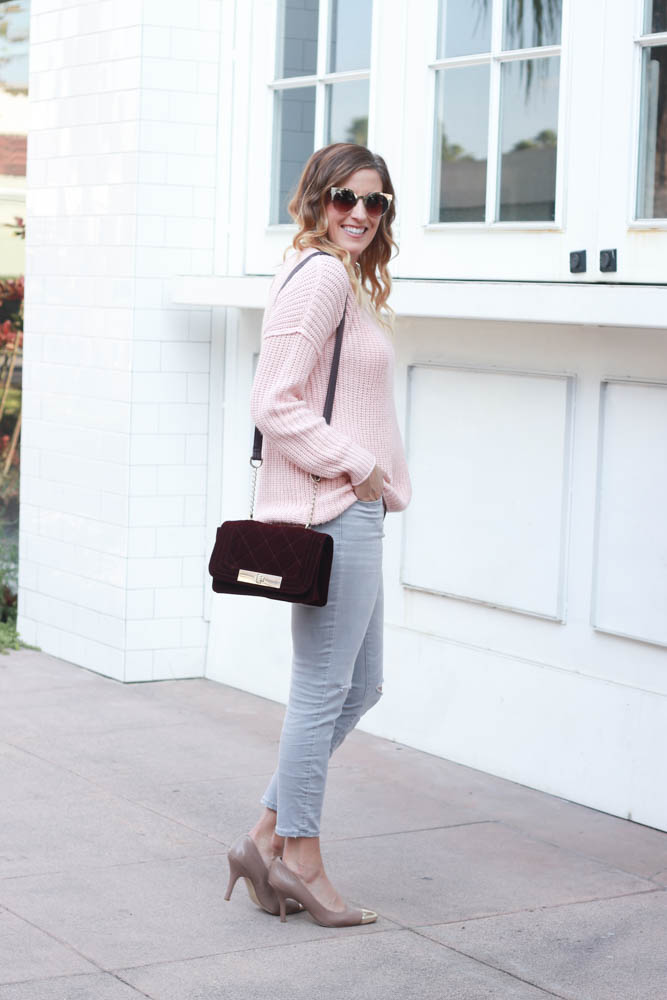 A great blush cozy sweater and burgundy velvet crossbody bag by popular Los Angeles fashion blogger The Fashionista Momma