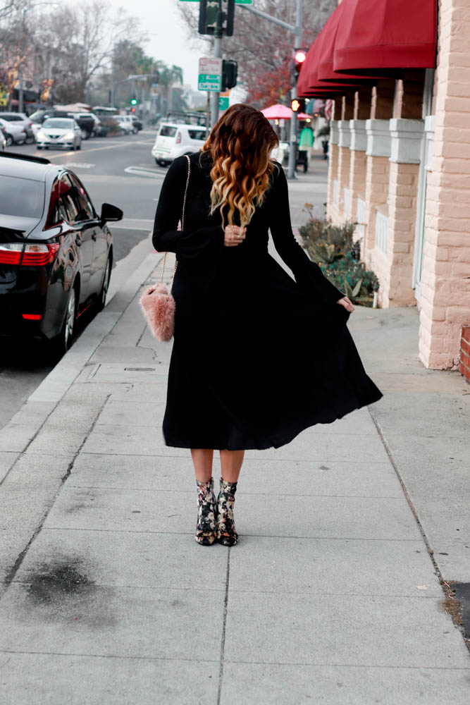 A black sweater dress for the opening of Japan House LA by popular Los Angeles fashion blogger The Fashionista Momma
