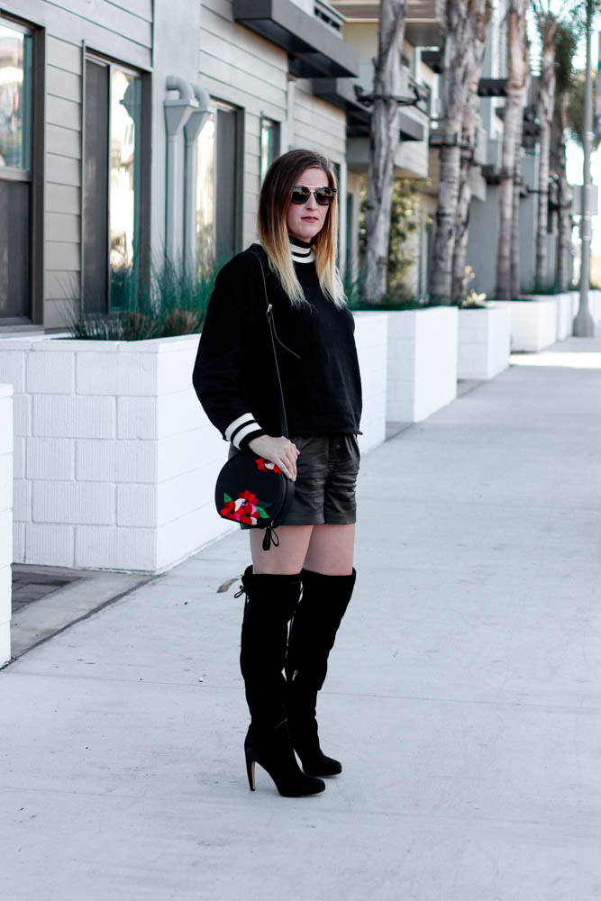 A great comfy sweater to go from day to night. Styled for a date night with leather boots and thigh high boots.