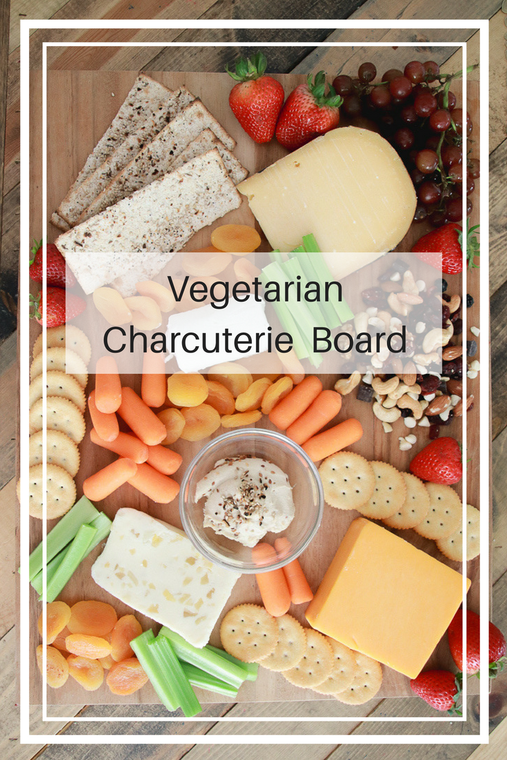 A Delicious Vegetarian Charcuterie Board featured by popular Los Angeles lifestyle blogger, The Fashionista Momma: different cheeses, crackers and proteins