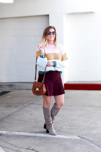 A cute sweater and skirt outfit for fall featured by Popular US Style Blogger, The Fashionista Momma; blonde woman wearing Nordstrom Striped Sweater and Suede Skirt.
