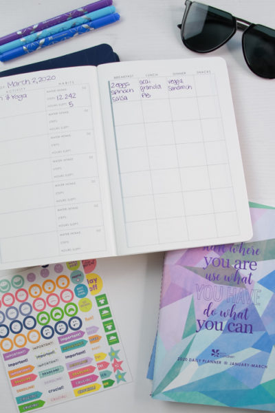 Marathon Training Guide With Erin Condren featured by The Fashionista Momma; flat lay of planner