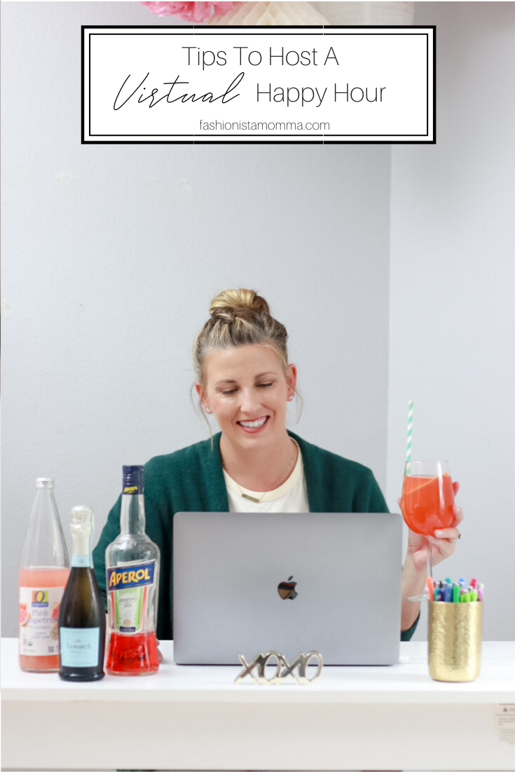 How To Host A Virtual Happy Hour with my a twist on an Aperol Spritz featured by popular US Lifestyle blogger, The Fashionista Momma; woman in front of computer with aperol spritz ingredients