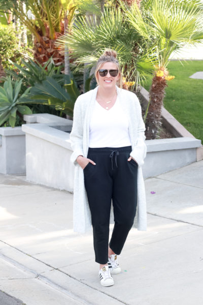 Comfy Casual Joggers featured by popular US Style Blogger, The Fashionista Momma; blonde women wearing black joggers and a cardigan
