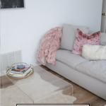5 Tips To Decorating Your Home On A Budget featured by popular US Home Decor Blogger, The Fashionista Momma; living room furniture with faux fur.