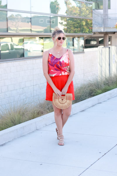 How To Wear Bright Shorts featured by popular US Style Blogger, The Fashionista Momma; woman wearing bright shorts with a printed tank top from Target.
