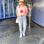 4 Spring Fashion Trends To Look Out For In 2021 featured by popular US Style Blogger, Style & Wanderlust; woman wearing wide pants and a graphic tee.